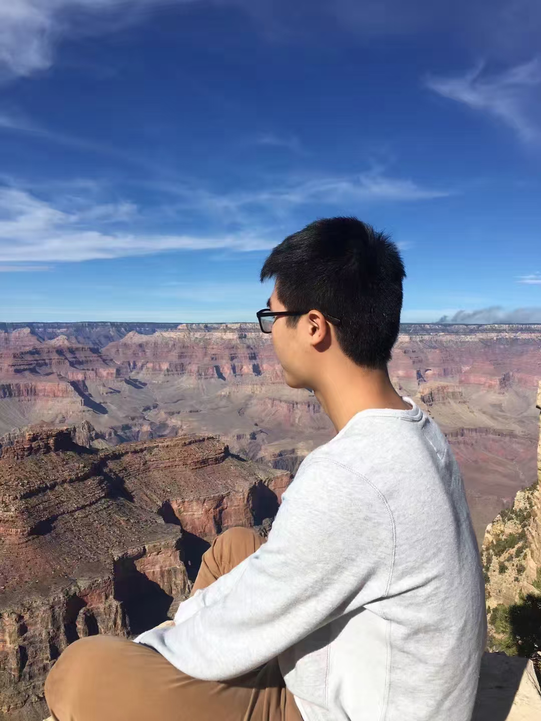 Joe looking over a canyon during his travels in the United States